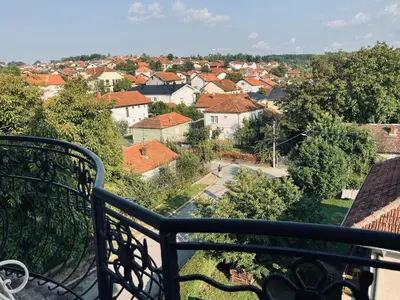 a view of a city from a balcony at Bubinga in Kruševac
