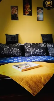 a bed with a picture on it in a room at Apartmani Sovica in Vrnjačka Banja