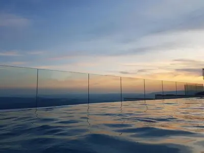 a row of glass walls on top of a building at Milmari MM L24 in Kopaonik