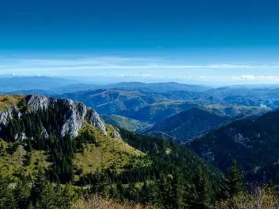 a view of a mountain with trees and mountains at Milmari MM L24 in Kopaonik