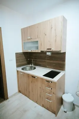 a bathroom with a sink and a toilet at Apartman Kostic Kraljev Konak in Kopaonik