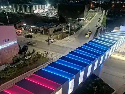 an overhead view of a building with blue and red lights at Apartman Breza in Kruševac