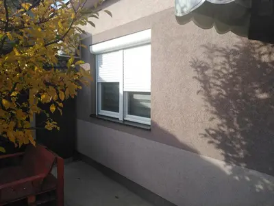 a window on the side of a building at APARTMAN “POD KRALJEVICOM” in Zaječar