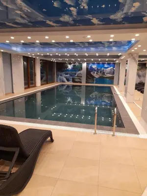 a swimming pool on a cruise ship at Prezident Marta in Kopaonik
