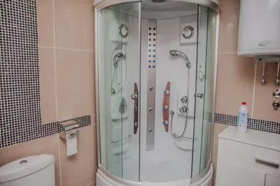 a shower with a glass door in a bathroom at Apartman Viva in Vrnjačka Banja