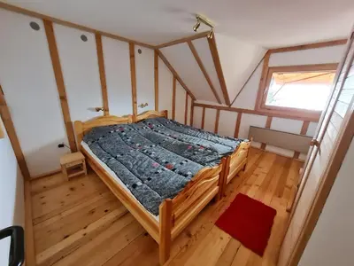 an overhead view of a bed in a room at Mountain House Mijatović in Kopaonik