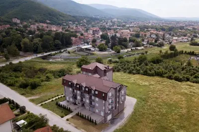 an aerial view of a building in a city at Lux Apartman Ristić 2 in Soko Banja
