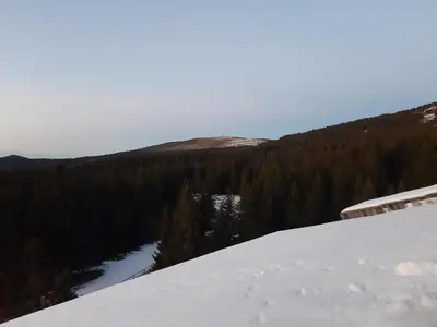 a view from the top of a snow covered mountain at Apartman Vrhovi Kopaonik Vila Nikola Centar in Kopaonik