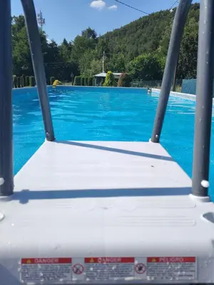 a view of a swimming pool from the back of a boat at Apartmani Mihajlovic Sisevac in Sisevac