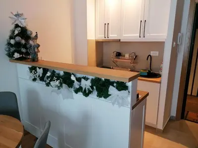 a kitchen counter with christmas decorations on it at Vila Irina Kopaonik in Kopaonik