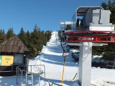 a snow covered ski slope with a ski lift at Sunčani Breg-Sunčana KOP studio in Kopaonik