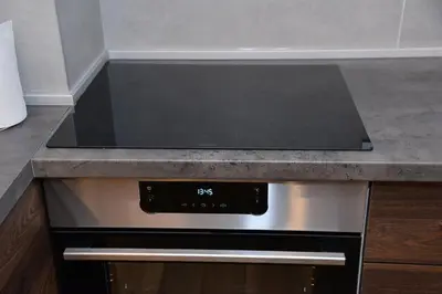 a stove top oven sitting in a kitchen at Bella apartments in Kruševac