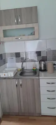 a kitchen with a sink and a counter top at Snezana home in Vranje