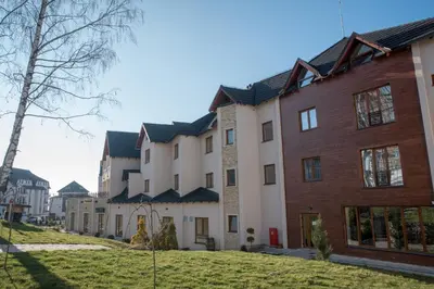 a row of buildings on a street at Apartman Klara S 23 in Kopaonik