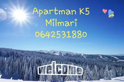 a poster for a ski slope with the sun and trees at Apartman K5 Milmari Resort in Kopaonik