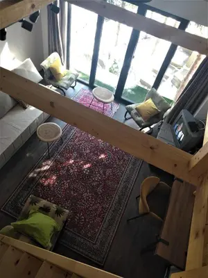 an overhead view of a living room with a large window at Dom sa pogledom Jela in Jelašnica