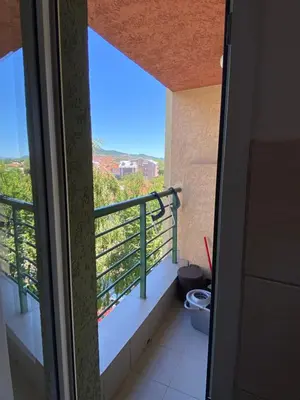 a view from the door of a room with a balcony at Apartman - stan na dan LENJINKA in Vranje