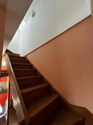 a staircase in a house with wooden steps at Ema A2 Kraljevi Čardaci in Kopaonik