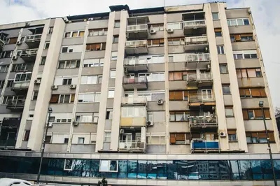 an apartment building with balconies on the side of it at Aparment Theatre in Niš