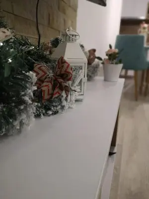 a white table with christmas decorations on it at P20 Milmari, DeLuxe Studio, Kopaonik in Kopaonik