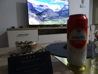 a bottle of ketchup sitting on top of a table at Apartman N&N in Vrnjačka Banja