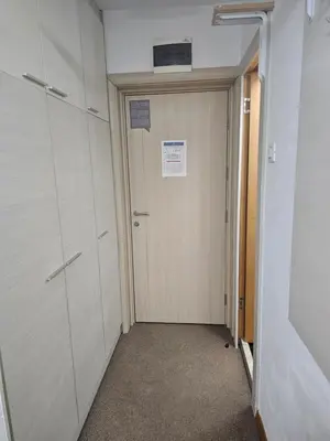 an empty hallway with a door in a room at Apartment Kockica Konaci in Kopaonik
