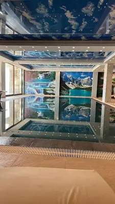 a balcony on a ship with a painting on the wall at Grand Elegant & Spa Kop in Kopaonik