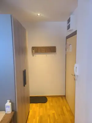 an empty room with a door and a sign on the wall at BELI VUK - Brzeće, Kopaonik in Brzeće