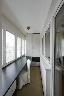 a kitchen with a long desk and some windows at Hotel Crystal - Depandans in Kraljevo