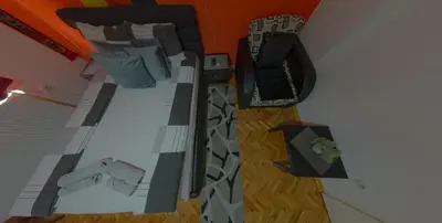 a view of a bedroom with a bed in a room at Vila Mala Evropa in Leskovac