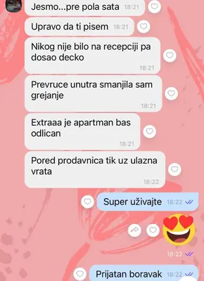 a screenshot of a cell phone with a text message about a pizza at Studio Jolly Kop Jana 2 in Kopaonik