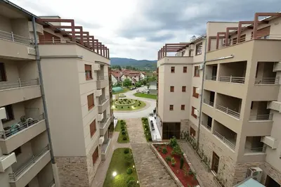 an aerial view of a street between two buildings at Apartman DiamondLux Vrnjacka Banja in Vrnjačka Banja