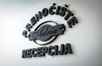 a rendering of a metal sign with the wordsalgias alma reg at Prenociste ADRIA in Vranje