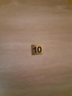 a wooden cube with the number on it at Studio Gmitrovic in Rtanj