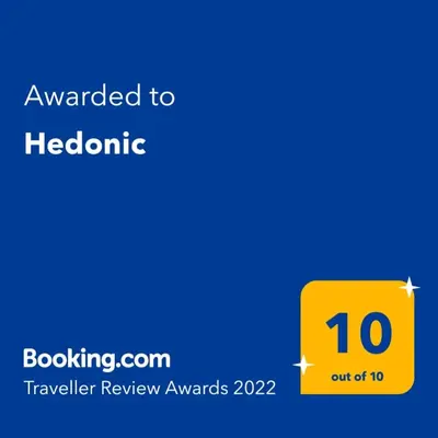 a yellow sign with the number on it at Hedonic in Kopaonik