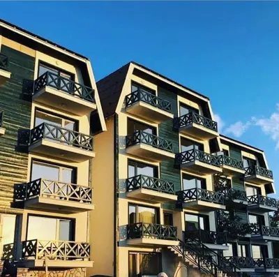 a building with balconies on the side of it at Hedonic in Kopaonik