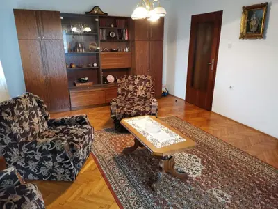 a living room with two chairs and a coffee table at Vila Milica in Kraljevo