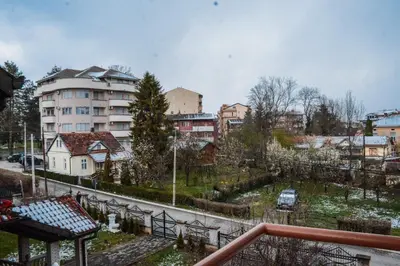 a view from a balcony of a city with buildings at Apartman La Casa Di Elena in Vrnjačka Banja