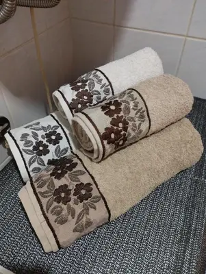 a couple of towels sitting on the floor in a bathroom at Studio City day in Jagodina