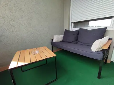 a living room with a couch and a table at Studio City day in Jagodina
