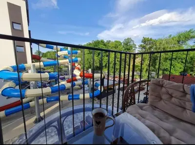 a view of a water slide on a balcony at Apartman TIM LUX 2 in Vrnjačka Banja