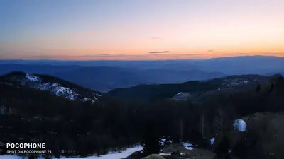 a view from the top of a mountain at sunset at President Kop - Apartman A21 in Kopaonik