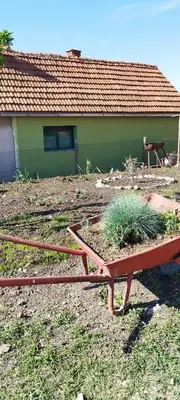 a bench in front of a house at Stancic 019 in Zaječar