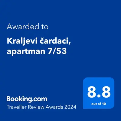 a screenshot of a cell phone with the text awarded to kalamazoo calendar at Kraljevi čardaci, apartman 53 u zgradi 7, opcija unutrašnjeg parking mesta in Kopaonik