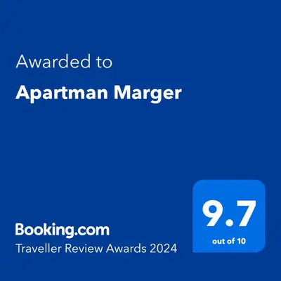 a blue screen with the text awarded to aprilanan manager at Apartman Marger in Niš