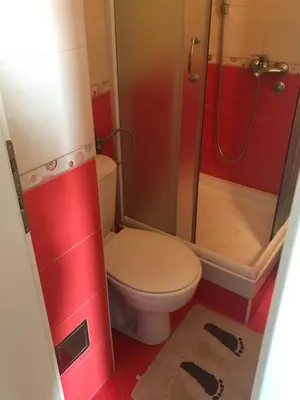 a bathroom with a toilet and a shower at Belvedere in Niš