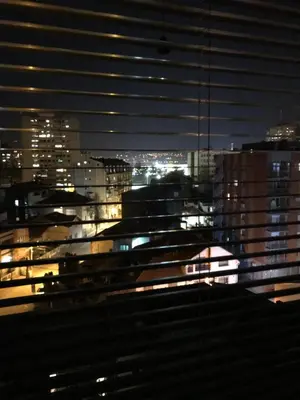 a view of a city at night with lights at Belvedere in Niš