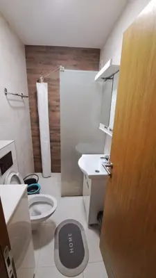 a bathroom with a toilet and a sink and a shower at Studio Soko Day 2 in Soko Banja