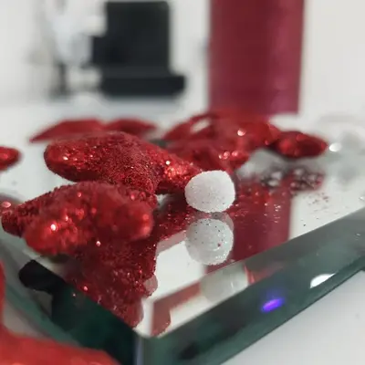 a pile of red glitter on top of a table at Lena7 in Vrnjačka Banja