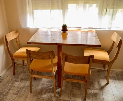 a dining room table with two chairs and a wooden table at Kuća za odmor Apartman Solo in Soko Banja